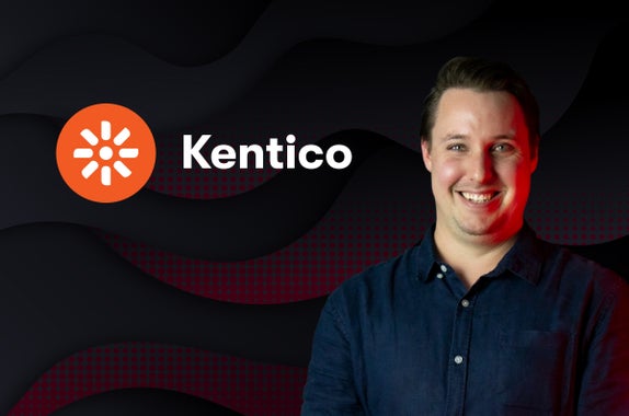 Zeroseven Solution Architect, Ben, next to the Kentico logo