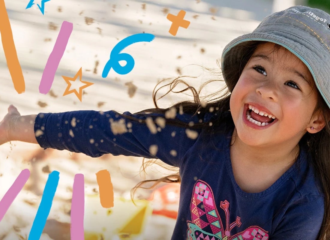 Goodstart attendee playing in a sandpit