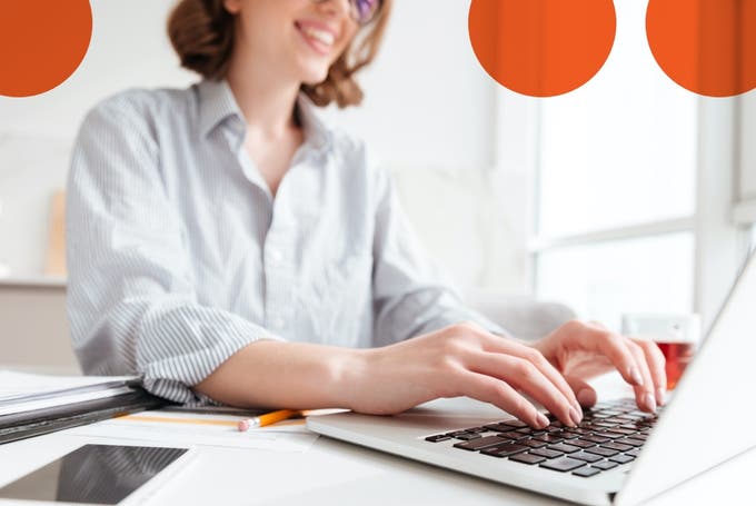 Kentico Xperience - woman entering content on laptop