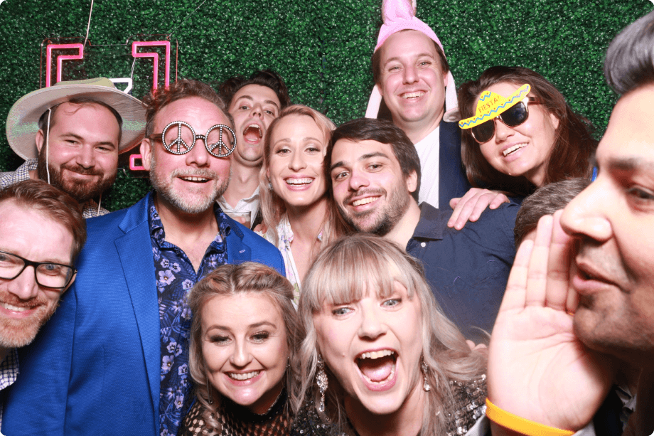 Group photo of Zeroseven staff in the photo booth